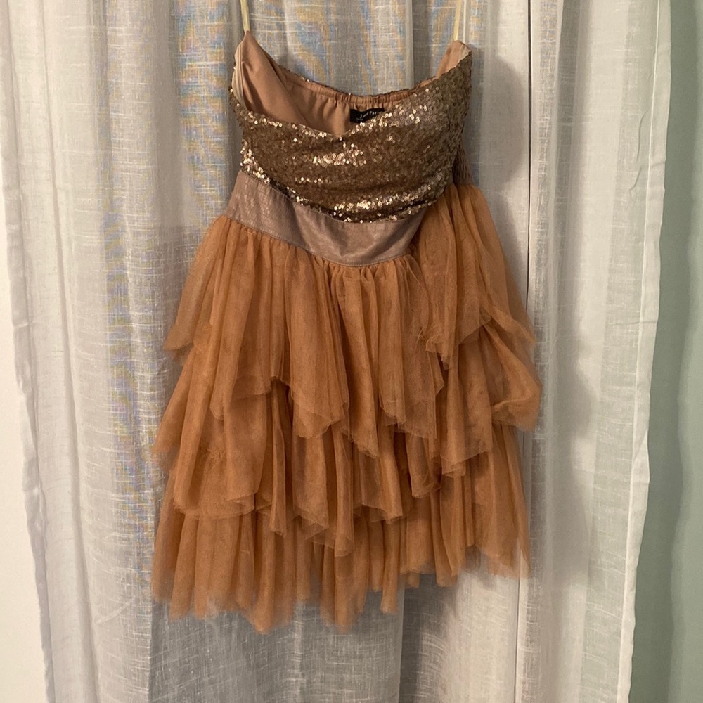 Ruffled dusky rose dress with sequinned top